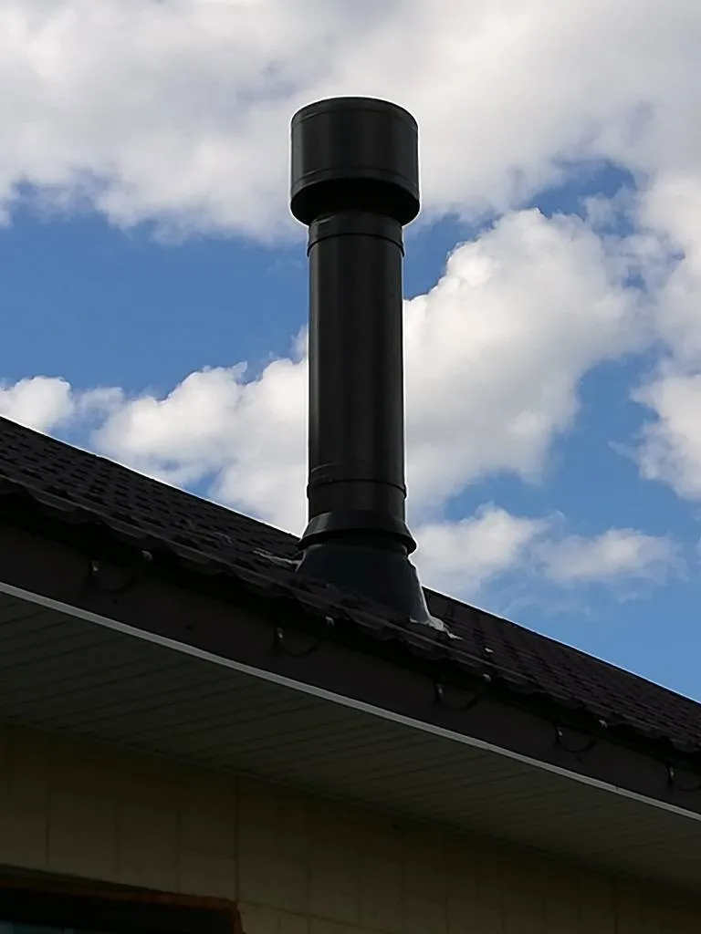 Фото Труба дымохода на крыше